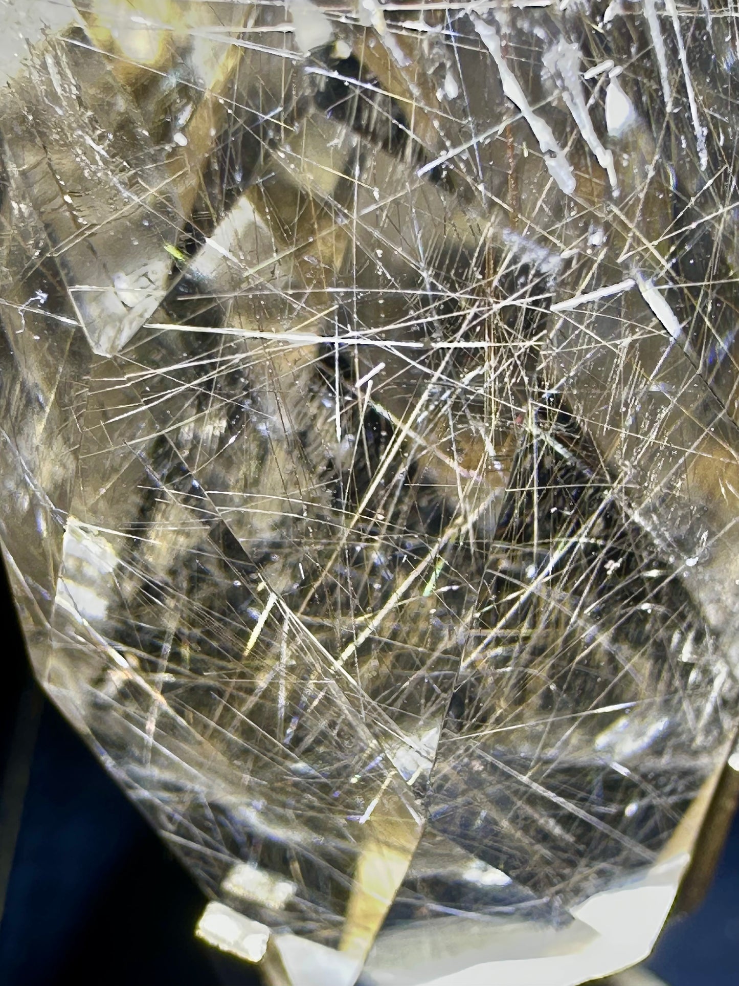 Faceted Rutile Smokey Quartz on stand